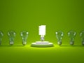 Energy efficient light bulb on podium Royalty Free Stock Photo