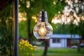 an energy-efficient lightbulb in a stylish outdoor lantern