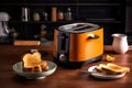 energy-efficient toaster, with toast popping up perfectly browned and crispy