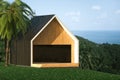 Energy efficient wooden house on the hill above the ocean Royalty Free Stock Photo