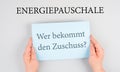 Energy flat rate, who receives the subsidy is standing in german language on the paper, finanical help for increasing prices Royalty Free Stock Photo