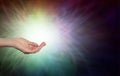 Energy healer with open hand and energy formation Royalty Free Stock Photo