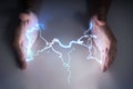 Energy and lightning in hands of healer or magician. Royalty Free Stock Photo