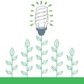 Energy saver light bulb with green plants Royalty Free Stock Photo