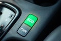 Energy-saving button ECO is working while driving, energy-saving driving mode Royalty Free Stock Photo