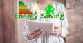 Energy Saving concept. Piggy bank, house, light bulb. Energy Efficiency Royalty Free Stock Photo