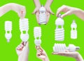 Energy saving concept. Woman hand holding light bulb on green Royalty Free Stock Photo