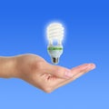 Energy Saving Lamp Above Hand
