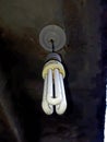 energy saving lamp, white light hanging on ceiling Royalty Free Stock Photo
