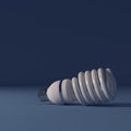 Energy saving and light bulb on blue background Royalty Free Stock Photo