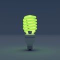 Energy saving light bulb on blue background Royalty Free Stock Photo