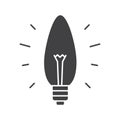 Energy saving lightbulb glyph icon