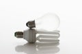 Energy saving lightbulb and light bulb Royalty Free Stock Photo