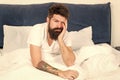 Energy and tiredness. Sleepy and handsome. asleep and awake. Too early to wake up. bearded man hipster sleep in morning