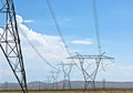 Energy Transmission Lines Across Desert Royalty Free Stock Photo