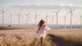 Energy woman wind generate technology back run turbine nature ecology electricity Royalty Free Stock Photo