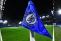 Corner Flag with Chelsea crest and Stamford Bridge in the background Royalty Free Stock Photo