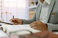 Engaged in conservation campaigning, a writer diligently works in a nature-inspired office, advocating for environmental law Royalty Free Stock Photo