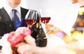 Engaged couple with wine glasses Royalty Free Stock Photo