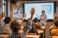 Engaged students raising hands in classroom, modern education and interaction Royalty Free Stock Photo