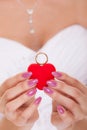 Engagement ring box in woman bride hands. Royalty Free Stock Photo