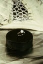 Engagement Ring on hockey puck with the inscription `Czech Republic` on the SILVER background. Royalty Free Stock Photo