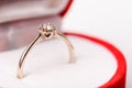 Engagement ring from the white gold with diamond in red velvet gift box Royalty Free Stock Photo