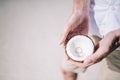 Engagement rings inside of the coconut on the tropical beach. Royalty Free Stock Photo