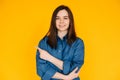 Engaging Businesswoman: Confident Young Female in Formal Office Attire with Bright Smile, Pointing at Blank Space - Isolated on Royalty Free Stock Photo