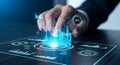 Engaging a dynamic digital interface, a professional hand navigates powerful business intelligence for strategic decision-making. Royalty Free Stock Photo