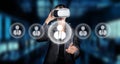 Engaging in Virtual Networking: A Business Professional Using VR Technology to Connect with Users in a Digital Royalty Free Stock Photo