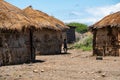 ENGARE SERO. TANZANIA - JANUARY 2020: Indigenous Maasai Boy near the Clay Hut in Traditional Village. Maasailand is the