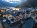 Engelberg Resort's Aerial View, featuring Hotel Bellevue amid Mountains.