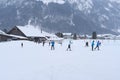 ENGELBERG, Switzerland - December 2020: young athletes, skiers skiing in snow, preparing for competition, natural winter