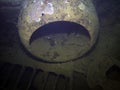 The engine cover of a Mitsubushi Zero in the cargo hold of a wreck