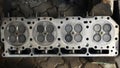 The engine cylinder head is sit above the cylinder chamber and regulates the mechanical rhythm of the combustion chamber Royalty Free Stock Photo