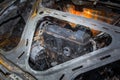 Engine of fully burned car in the forest in summer Royalty Free Stock Photo
