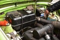 Engine of a Green Trabant 601 with hand pointing Berlin Germany Royalty Free Stock Photo