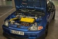 Engine of a Honda Civic EG 1.6 Vtec with an open hood Royalty Free Stock Photo