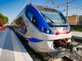 An Italian regional train type ETR 427 waiting at the platform at Pompeii Station in Italy