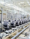 Automated production line with new engines in car factory Royalty Free Stock Photo