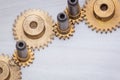 Engine metal gear wheels on wooden background Royalty Free Stock Photo