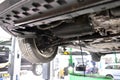 Engine oil change in a garage - vehicle on the lifting platform Royalty Free Stock Photo