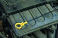 Engine oil dip stick in a car. Royalty Free Stock Photo