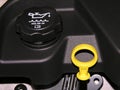 Engine oil dipstick and oil cap. Royalty Free Stock Photo