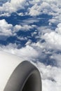 Airplane engine above clouds Royalty Free Stock Photo