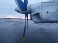 Engine and propeller of the old transport plane close-up. Fragment of the aircraft. Royalty Free Stock Photo