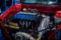 The engine of Red Mitsubishi Lancer Evolution IV drag car in Indonesia Modification Expo 2023