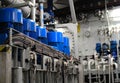 Engine room interior of a big ocean going ship with electrical motors, piping, gauges, valves etc. Royalty Free Stock Photo