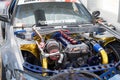 Engine of silver Nissan Silvia S13 5 with an open hood